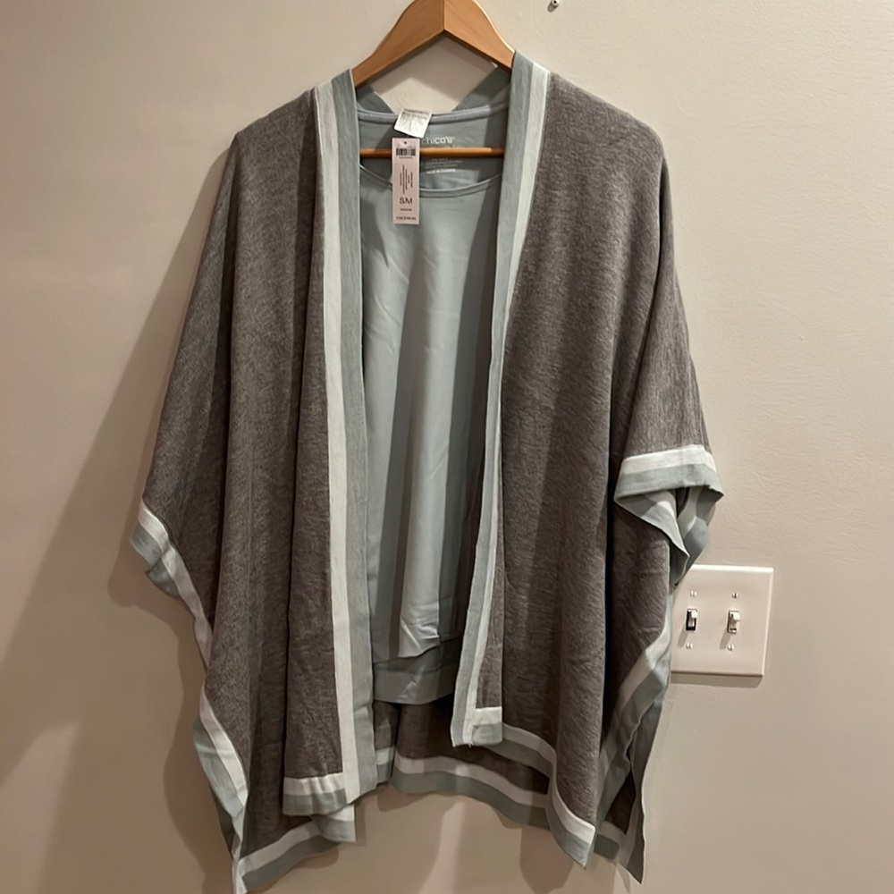 Pretty gray with sea foam green stripped poncho from Chico’s.
